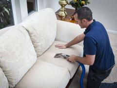 A ProTech Carpet Care technician cleaning upholstery for yet another client in the Greensboro area.