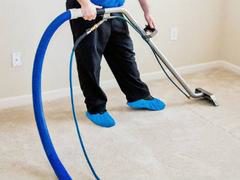 A ProTech Carpet Care technician using the latest in hot water extraction technology to satisfy another steam carpet cleaning customer.